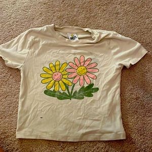 flower tee shirt it has a small stain on it